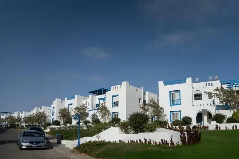 White and blue homes at Mountain View Ras El Hekma